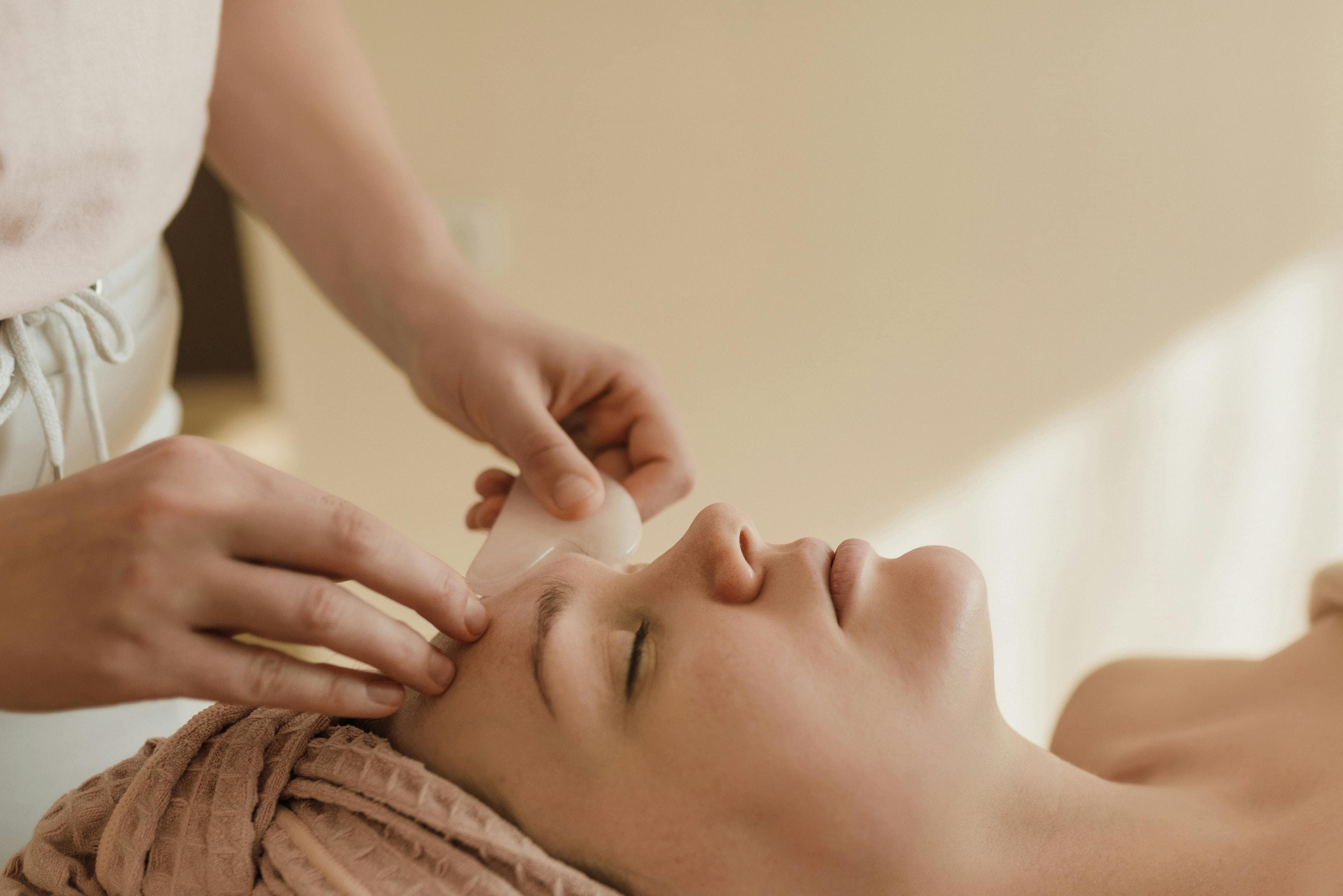 Gentle facial massage treatment using traditional Habesha techniques at Meborat Spa